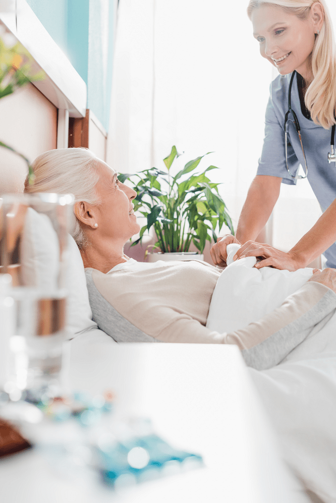 Elderly Woman Being Taken Care Of