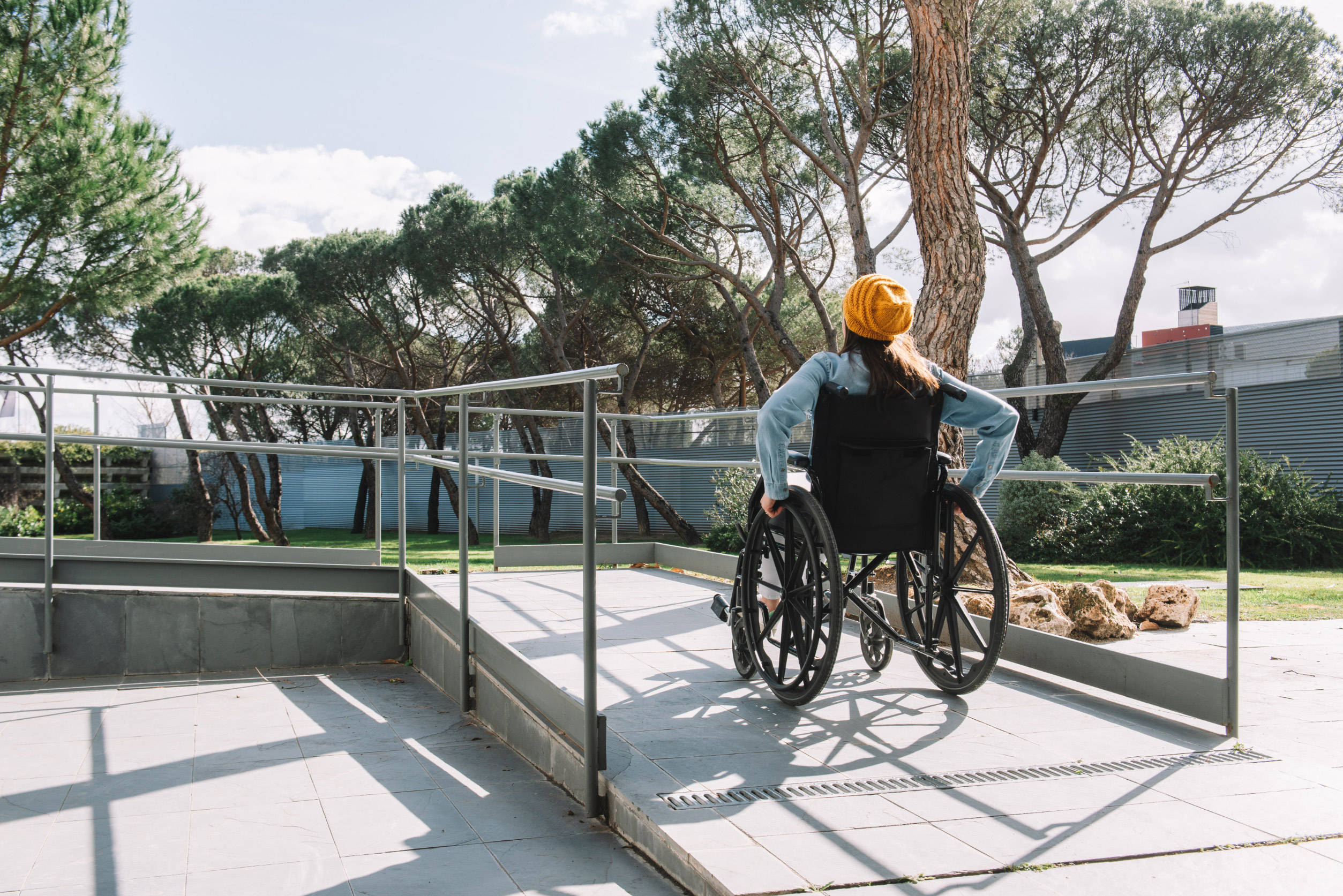 woman using wheelchair ramp